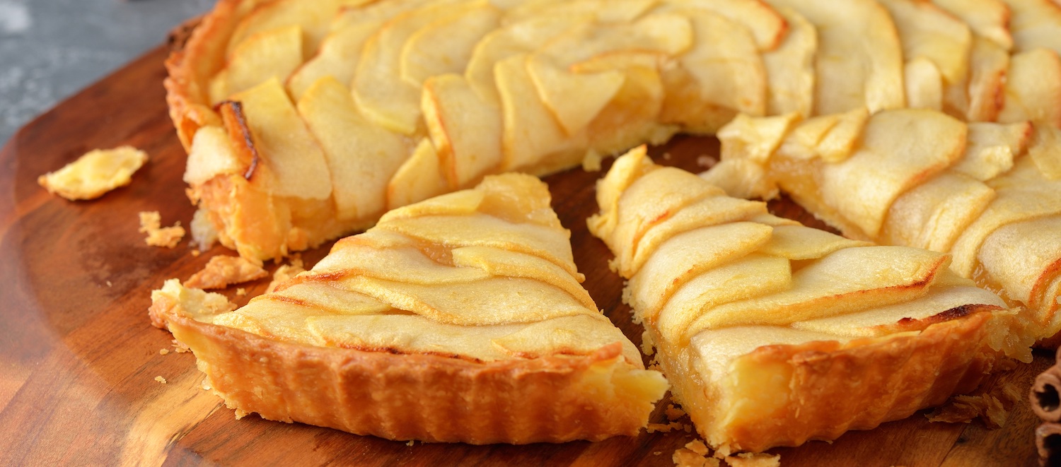 French apple tart cut into wedges
